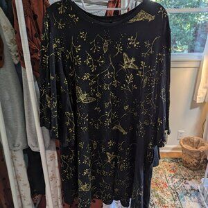 Simka Sol Moth Dress in Soft Black Cotton with gold screen printing and bell sle